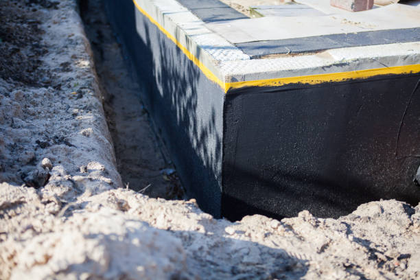 Professional Waterproofing technician working in Lakeview, MI